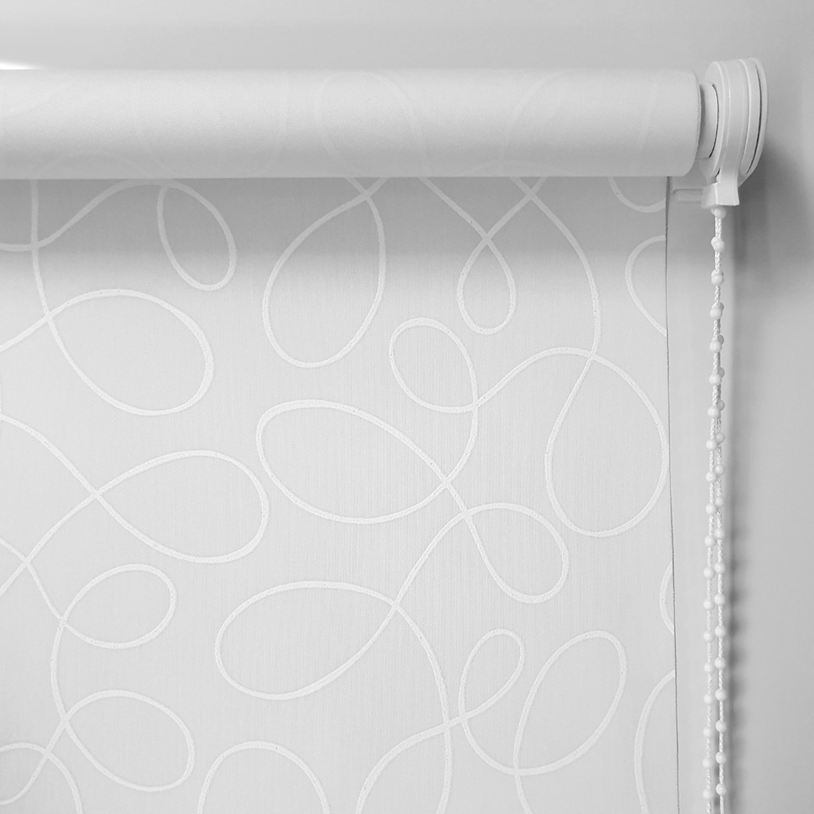 Store enrouleur tamisant motif méli mélo